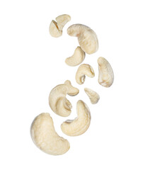 Dried crushed and whole cashew nuts in the air close-up isolated on white background