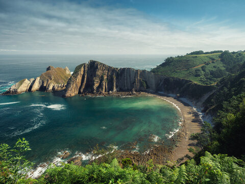 Scenic Turquoise Bay and Dramatic Cliffs at Playa del Silencio, Asturias