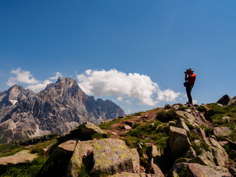 Photograph in the mountains with Dolomites in the background