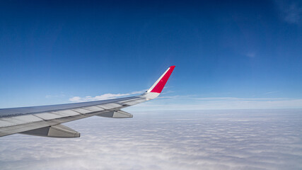 Obraz premium view from airplane window clouds