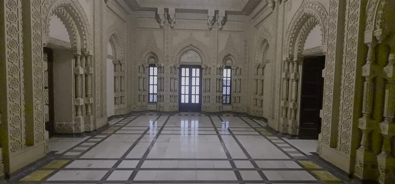 Grand interior and intricate architectural details of Lalbagh Palace in Indore