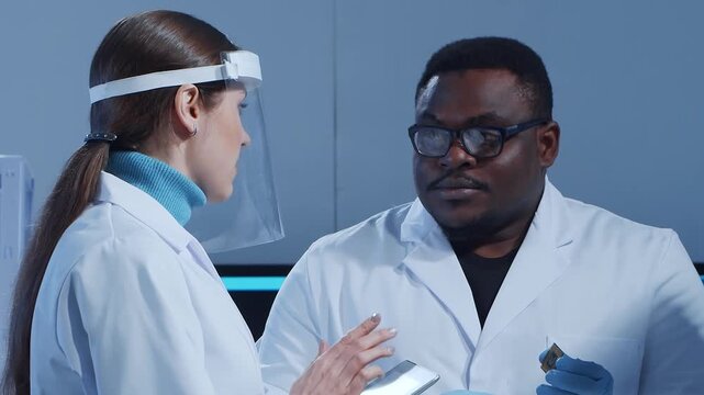 Scientific laboratory filled with various research equipment. Scientists are conducting experiments and research. Science and technology concept.