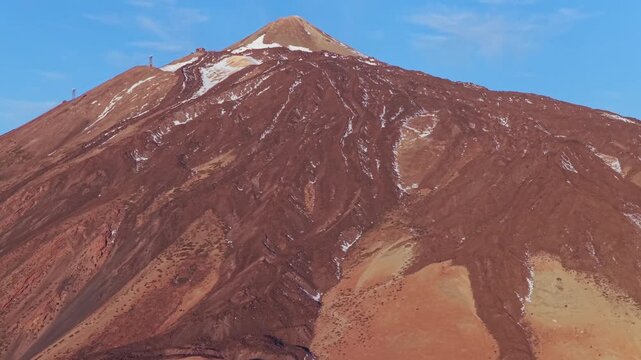 Cinematic aerial sunrise above the sea of clouds and Mount Teide peak in Tenerife Canary Islands