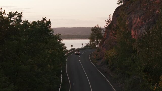 Car driving winding road samarskaya luka river landscape