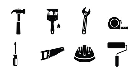 Fototapeta premium Collection of black silhouette tools including a hammer wrench and safety helmet