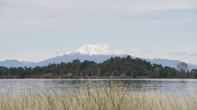 Scenic Lake Llanquihue with Cerro Tronador in background, serene landscape in Los Lagos, Chile
