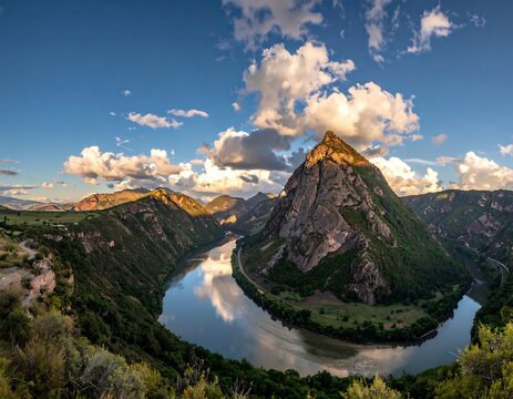 Stunning view of Uvac River meanders in Serbia under a cloudy sky.