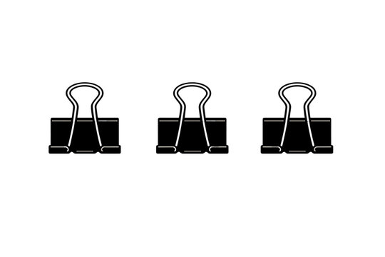 A minimalist black and white illustration featuring three binder clips arranged in a horizontal row. This simple line art depicts common office stationery on a dark background.