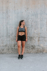 Fototapeta premium portrait of Young Hispanic woman in sportswear outdoors