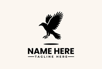 Obraz premium A black silhouette of an eagle in flight with outstretched wings, positioned above a horizontal line and text placeholder on a beige background, forming a logo or icon design.