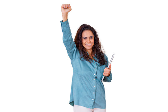 Woman celebrating success, raising fist and holding a tablet, achieving goals, feeling empowered and happy on transparent background