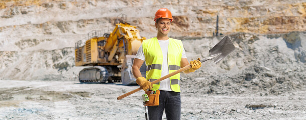Construction worker holding a shovel
