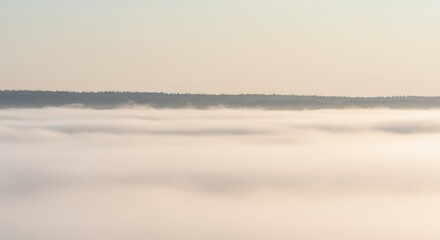 Obraz premium A thick layer of atmospheric phenomena creating a dense, pale, and mysterious backdrop across a vast distant landscape ,landscape ,weather ,density