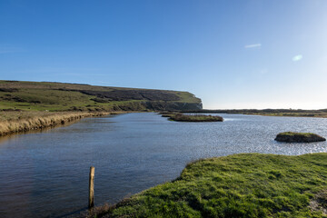 A view of the Cuckmere River in Sussex, on a sunny winter's day