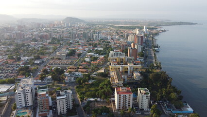 Urban coastal landscape with waterfront road and modern apartment buildings © JoseMaria