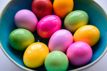 Colorful Easter Eggs in a Blue Bowl