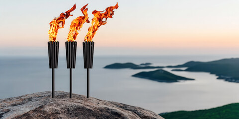 Three flaming torches stand atop a rock overlooking a tranquil sunset seascape