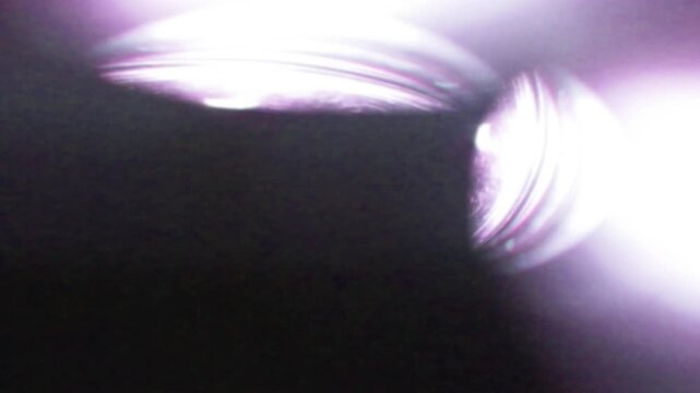 Edgy Bokeh Light Flash Transition, Dark Frame Sequence with Purple Light Edges. best for horror border