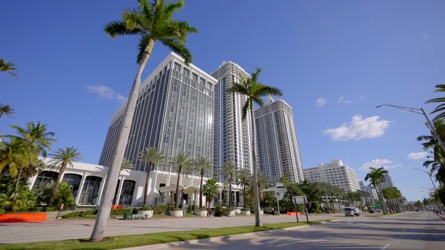 Stock video motion tour highrise towers Miami Beach Collins Avenue