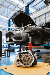 Car Transmission Replacement in Auto Repair Garage Workshop