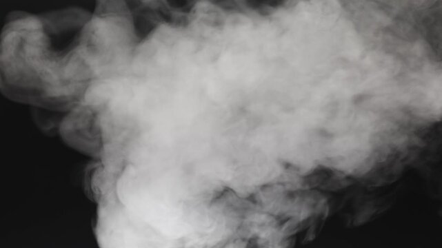 Steam, smoke, vapor isolated on black background. Smoke steam spray, abstract vaporing water, texture of cold mist, hot vapor, fog effect closeup, black screen.  