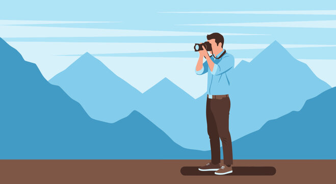 Man Capturing Majestic Mountain Scenery With Camera