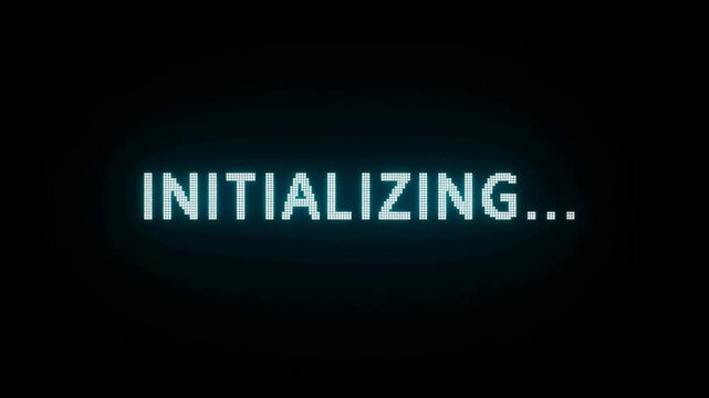 Digital display showing the word "INITIALIZING" in bright pixels against a dark background. Represents the startup process of technology or software systems