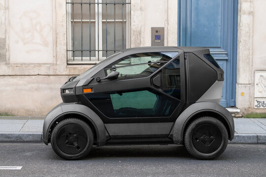 Nancy, France - January 15th 2026 : View on a matte black Mobilize Duo parked on a street. It's a two-seater electric quadricycle designed for urban mobility.