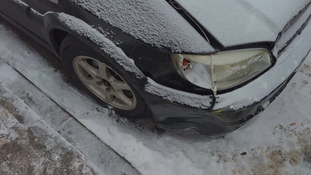 Photographic evidence of collision damage including paint chips and structural deformities
