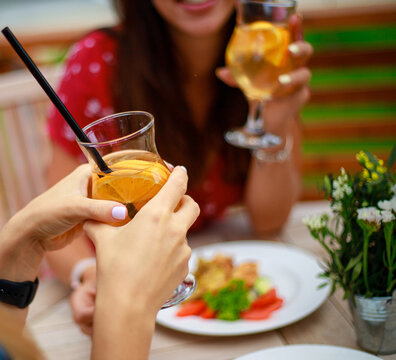 Refreshing Drink and Delicious Food at an Outdoor Cafe