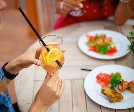 Friends Toasting at a Rooftop Party