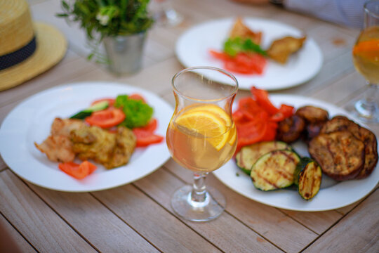 Refreshing Drink and Delicious Food at an Outdoor Cafe