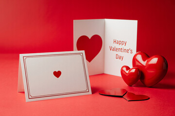 Valentines Day greeting card with red heart on white background in soft romantic lighting for love celebration