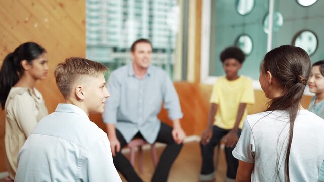 Smart girl raising hand to ask question during doing group therapy. High school student put hand up to ask question, voting, volunteering, asking, answering question between group meeting.Edification