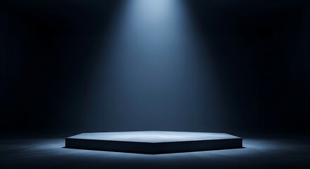 A spotlight illuminates an empty hexagonal stage, creating a dramatic and focused atmosphere for a presentation or performance