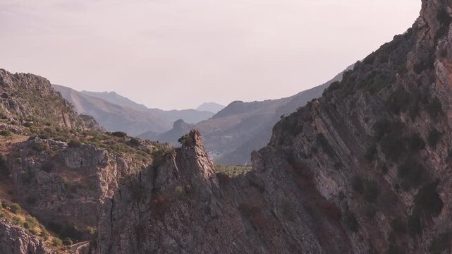 Aerial view of Montejaque dam and massive limestone cliffs in Ronda mountains