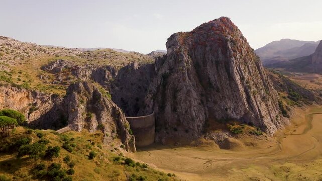 Aerial view of Montejaque dam and massive limestone cliffs in Ronda mountains