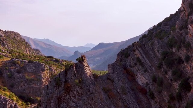 Aerial view of Montejaque dam and massive limestone cliffs in Ronda mountains