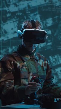 Soldier in a dimly lit military control room, intensely focused on multiple computer screens displaying crucial operational drone data.
