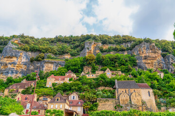 La Roque-Gageac Village Built Into Limestone Cliff Along the Dordogne River, France