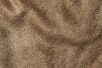 Dark beige suede leather texture background, velvet fabric