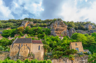 La Roque-Gageac France Village Tourist Attraction Carved Into Rock Face Beside the Dordogne River
