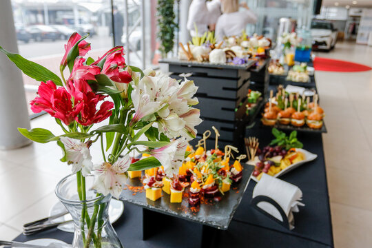 Elegant Mini Sandwiches and Canaps on a Dark Platter