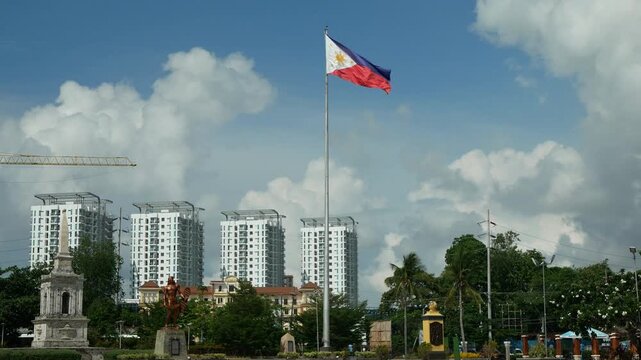 Flag Philippines Lapu-Lapu shrine monument on Mactan Island in Cebu Datu, local hero defeated Spanish colonizers led by Ferdinand Magellan. Commemorating battle of Mactan heroism up rising City