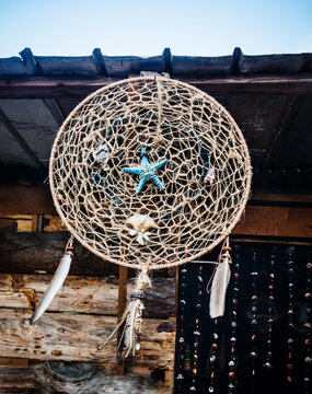 Dream catcher with starfish and feathers, Panama City, Panama, Central America