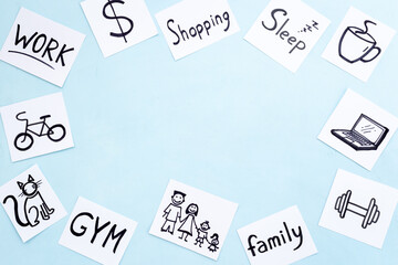Many paper cards with hand drawing of different life activities. Life balance concept