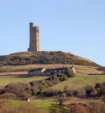 A view across the Colne Valley from Huddersfield looking towards a medieval castle sited on an early Iron Age hill fort overlooking the valley for the last 4000 years