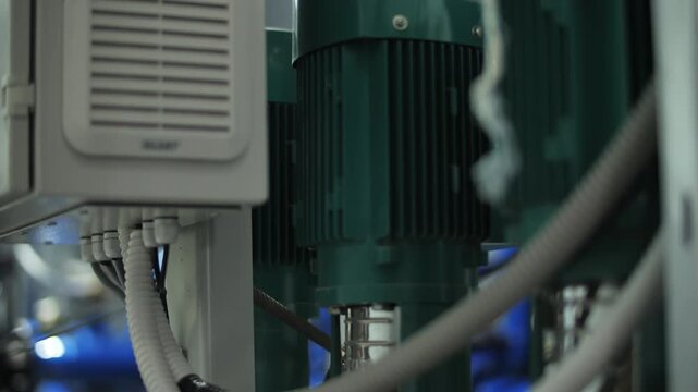 Electric pump units with motors and piping inside pumping station