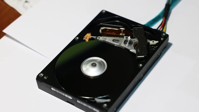 Open Hard Disk Drive Spinning Close-Up