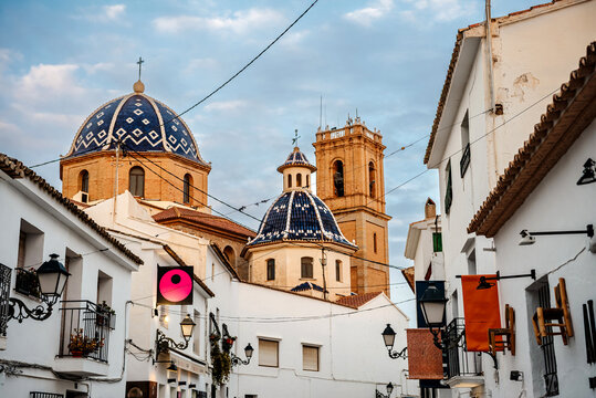 Altea, Spain. A hilltop church with unique blue mosaic domes and picturesque views of the Mediterranean Sea.